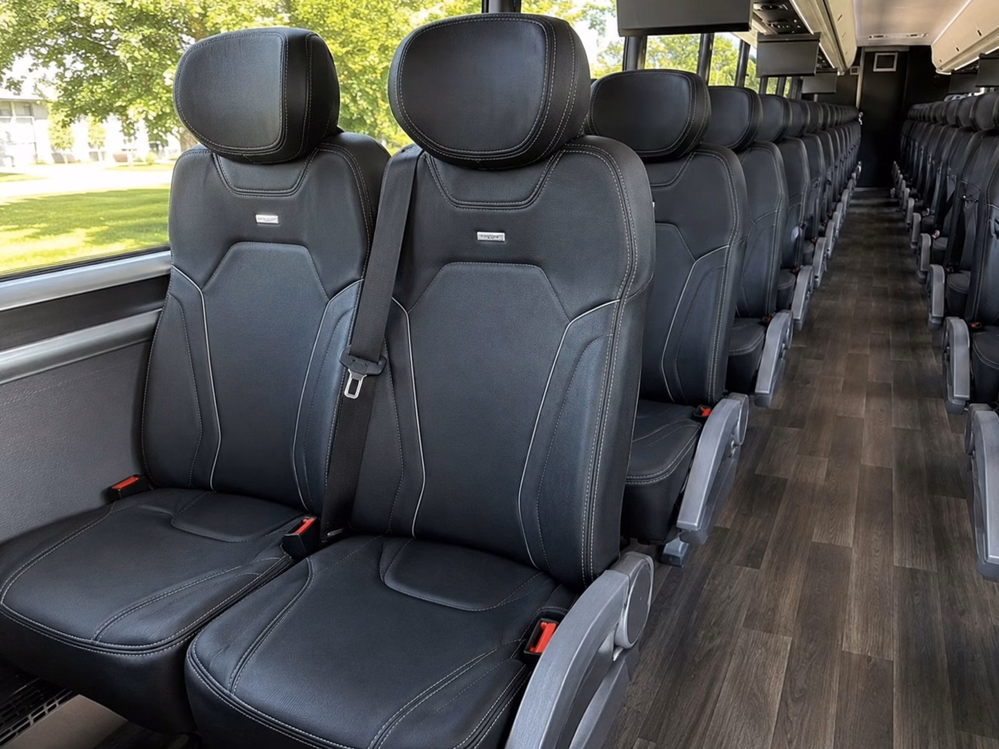 university of oklahoma and oklahoma state fan bus rentals road trip transportation for sooner and cowboy fans